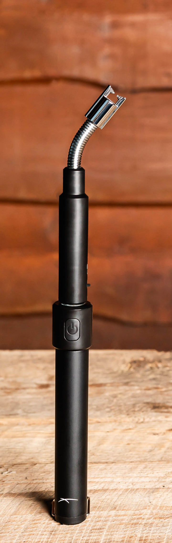 Black Extender lighter standing upright