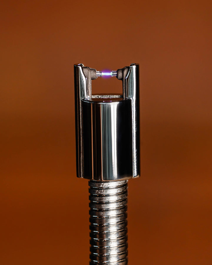 Extender lighter tip with plasma arc engaged